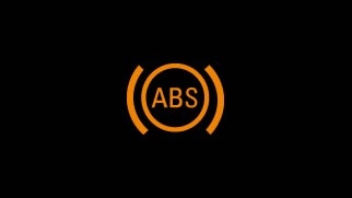 Icône orange du témoin d’alerte du système ABS, cerclée avec mention ABS sur fond noir.